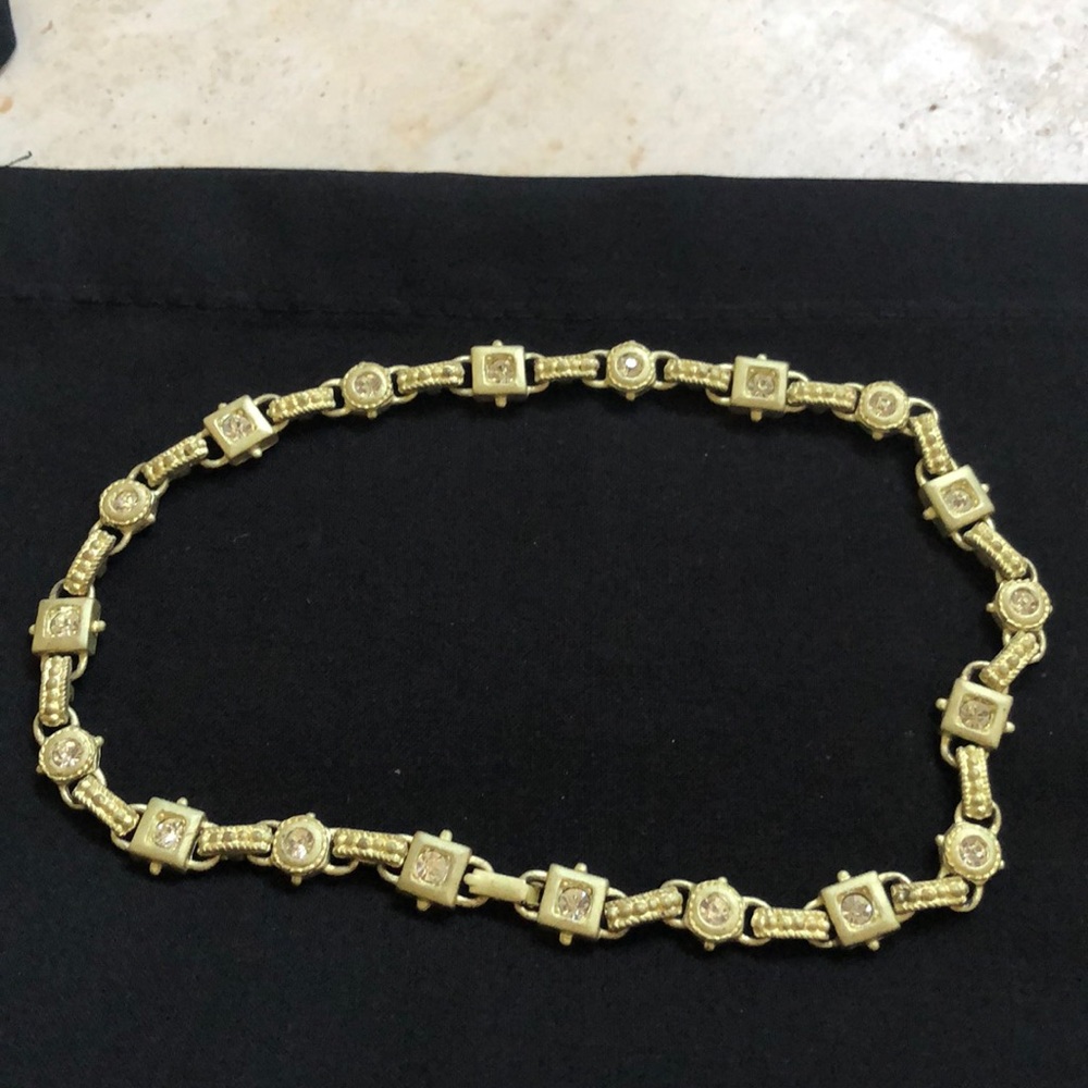 Fashion jewelry necklace and clip on earrings.